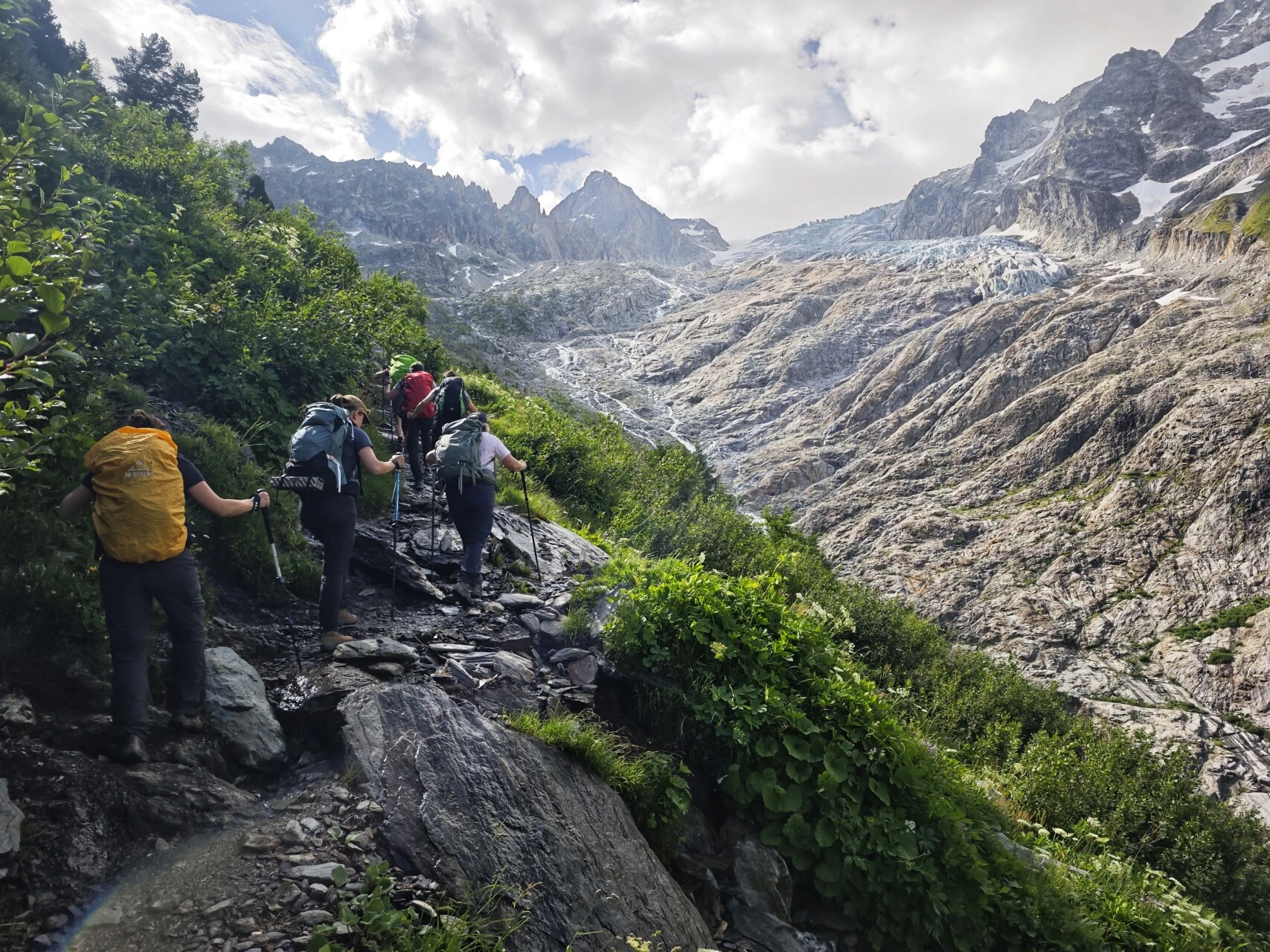 Walkers on the moraine of the Glacier du Trient