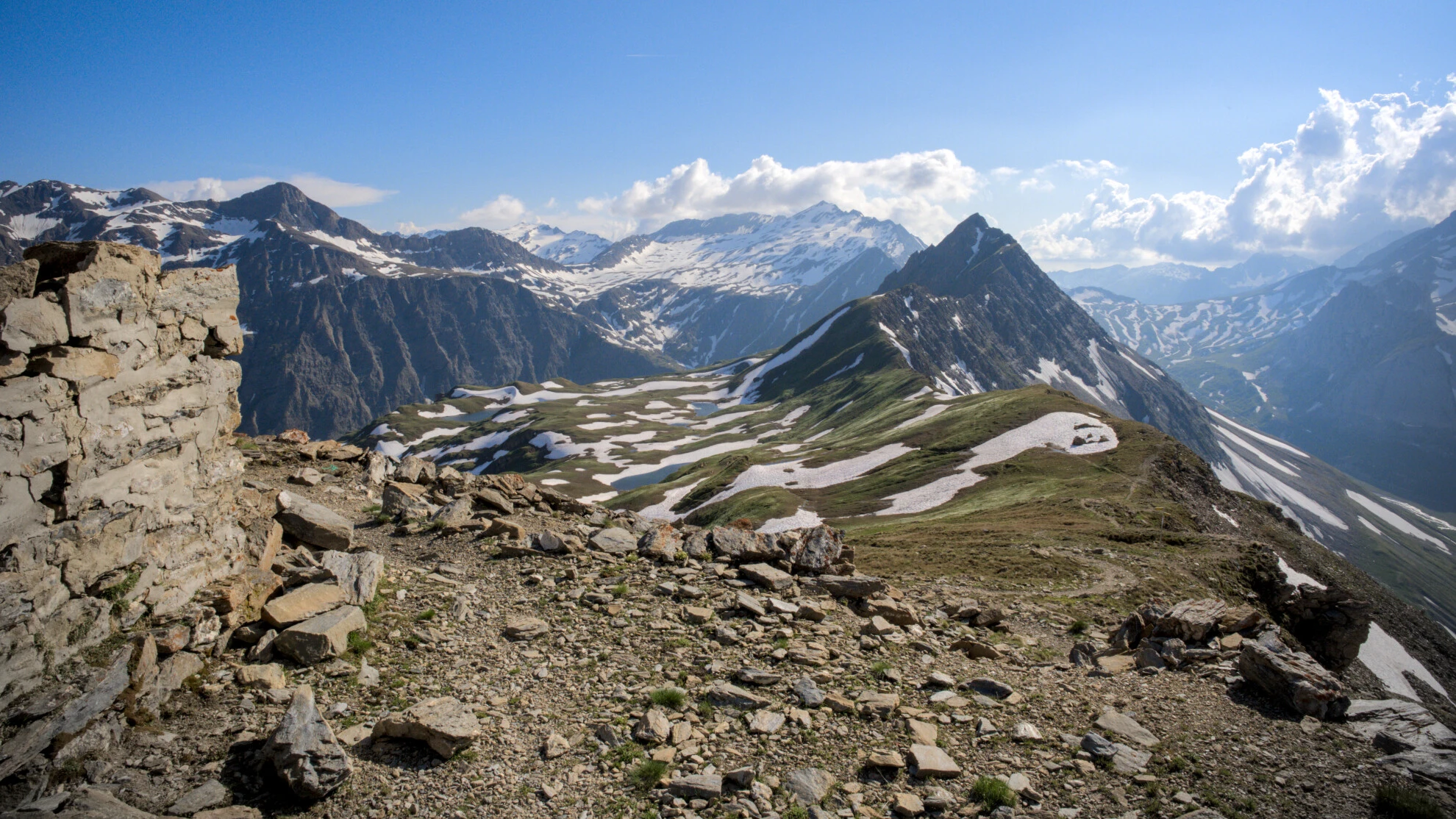 The Mont de la Saxe ridge with its early-summer snow patches