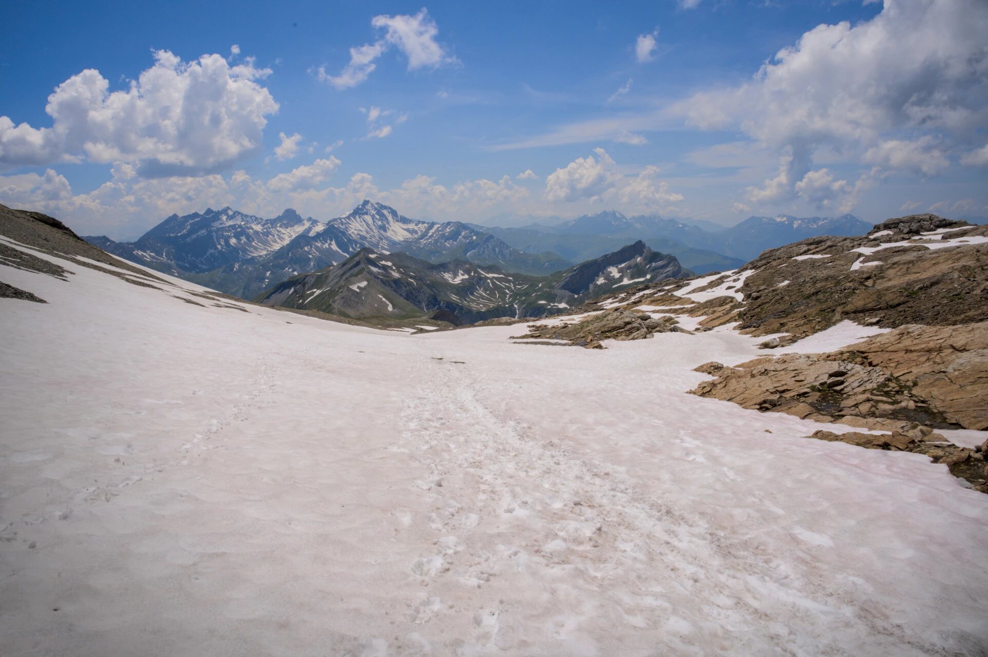 Crossing a snow patch at the col de la Croix du Bonhomme, early in the season